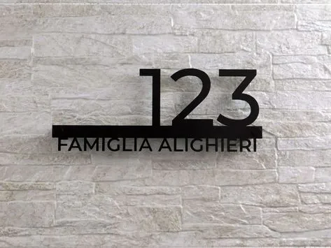 Black acrylic address sign reading 123 Famiglia Alighieri
